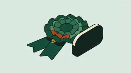 Ribbon rosette beside a blank rounded plaque