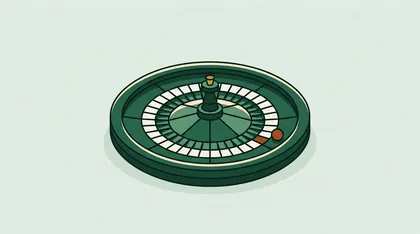 Roulette wheel from a low angle with one ball on the rim